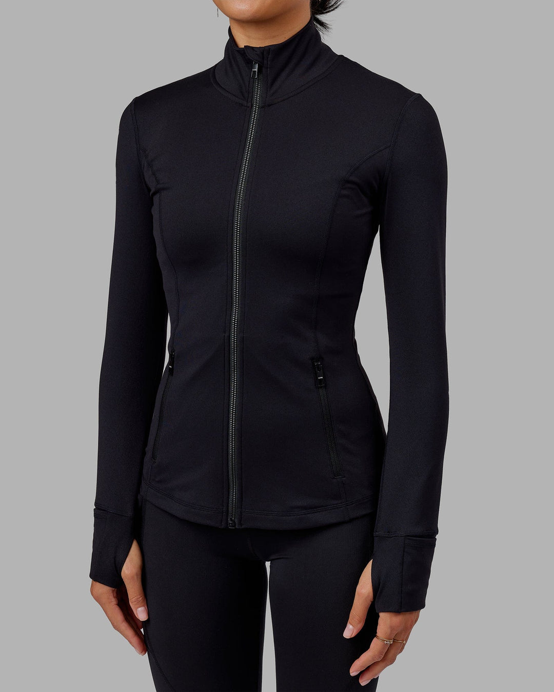 Woman wearing Stride Zip Through Jacket - Black - view 9