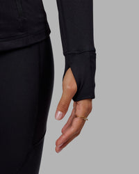 Woman wearing Stride Zip Through Jacket - Black | Thumbnail Index: 4