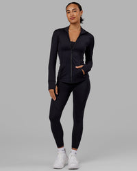 Woman wearing Stride Zip Through Jacket - Black | Thumbnail Index: 6