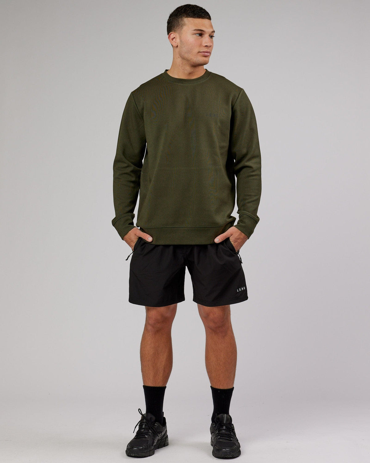 Man wearing Athlete ForgedFleece Sweater - Forest Night