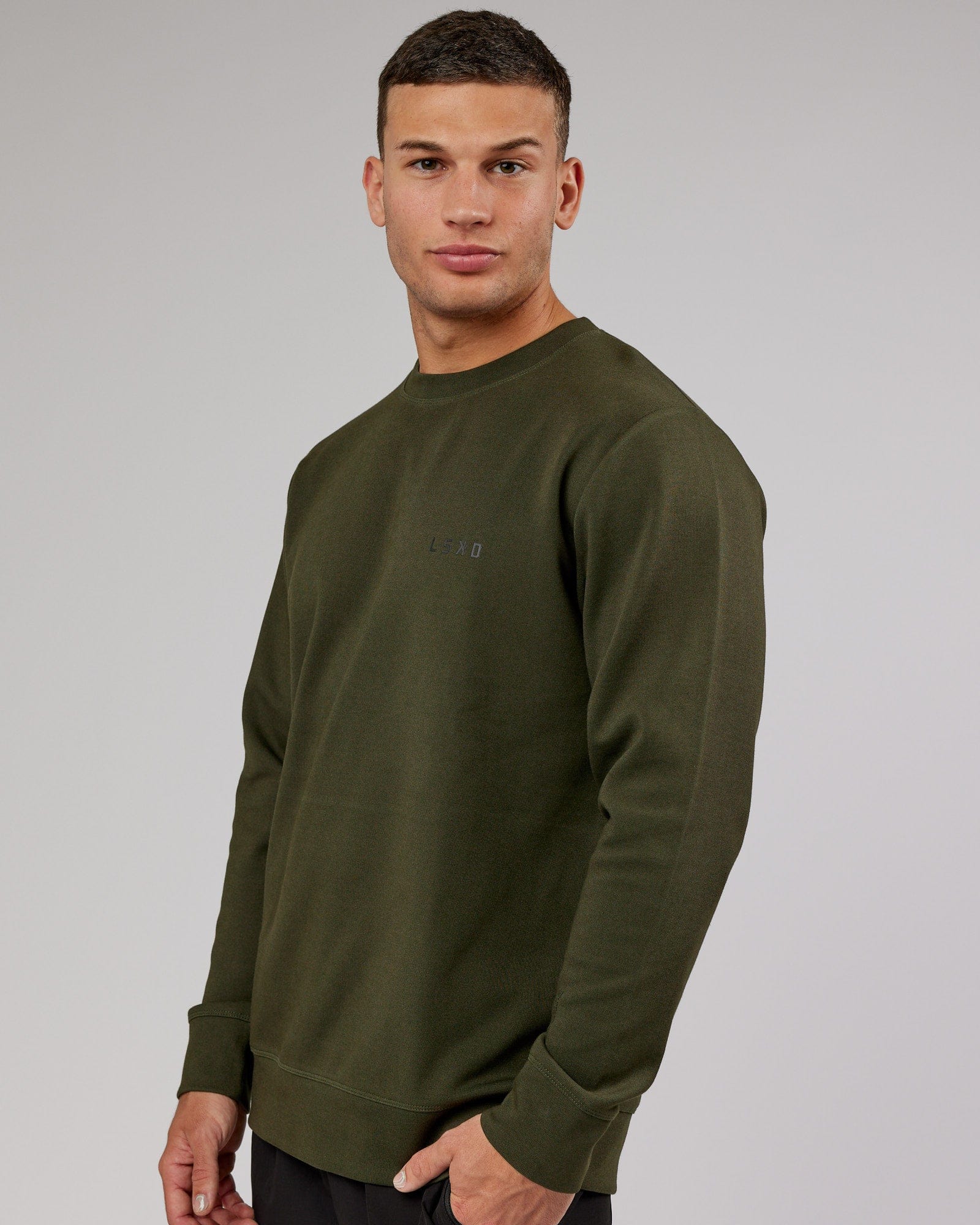Man wearing Athlete ForgedFleece Sweater - Forest Night