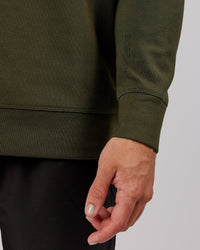 Man wearing Athlete ForgedFleece Sweater - Forest Night | Thumbnail Index: 6