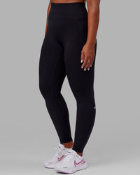 Woman wearing O.G. Fusion Ultra High-Rise Tall Legging Pockets - Black | Model:Sierra | Size:L | Thumbnail Index: 6