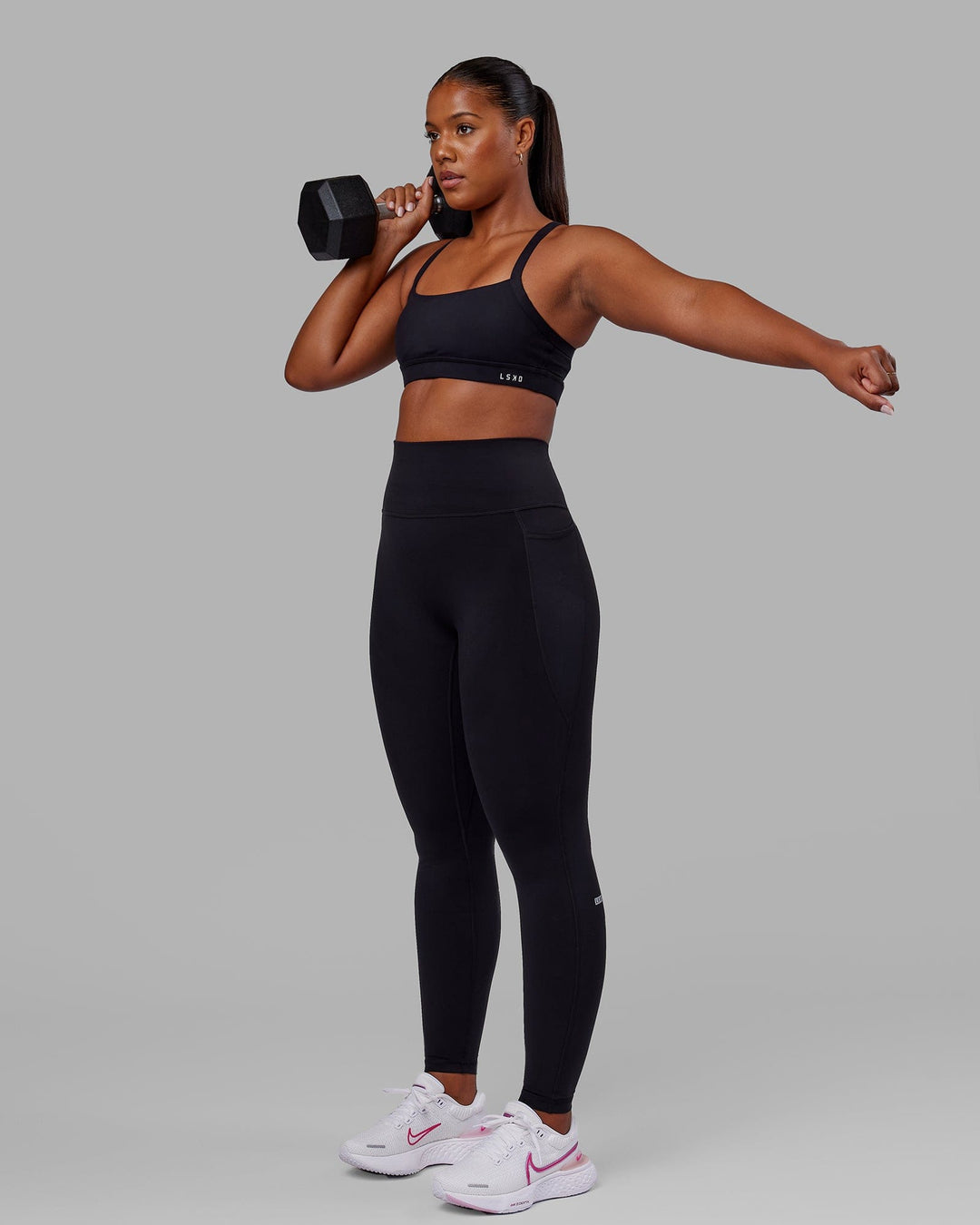 Woman wearing O.G. Fusion Ultra High-Rise Tall Legging Pockets - Black | Model:Sierra | Size:L - view 6