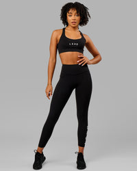 Woman wearing Rep Ultra High-Rise 7/8 Legging Pockets - Black-White | Model:Isabella | Size:S | Thumbnail Index: 7