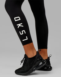 Woman wearing Rep Ultra High-Rise 7/8 Legging Pockets - Black-White | Model:Isabella | Size:S | Thumbnail Index: 10