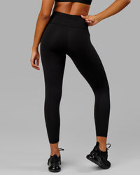 Woman wearing Rep Ultra High-Rise 7/8 Legging Pockets - Black-White | Model:Isabella | Size:S | Thumbnail Index: 3
