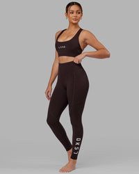 Woman wearing Rep Ultra High-Rise Full Length Legging Pockets - Dark Walnut | Model:Catalina | Size:S | Thumbnail Index: 8