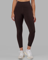 Woman wearing Rep Ultra High-Rise 7/8 Legging Pockets - Dark Walnut | Model:Catalina | Size:S | Thumbnail Index: 8