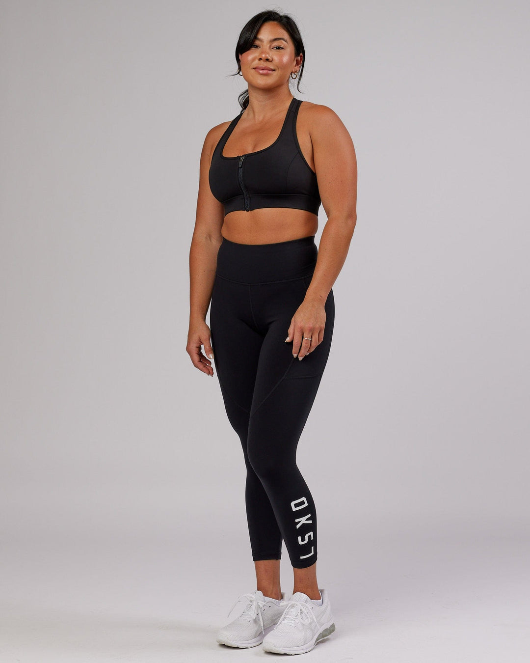 Woman wearing Sprint Sports Bra - Black - view 9