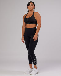 Woman wearing Sprint Sports Bra - Black | Thumbnail Index: 8