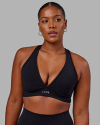 Woman wearing Stamina Sports Bra in Black | Size:L | Thumbnail Index: 3