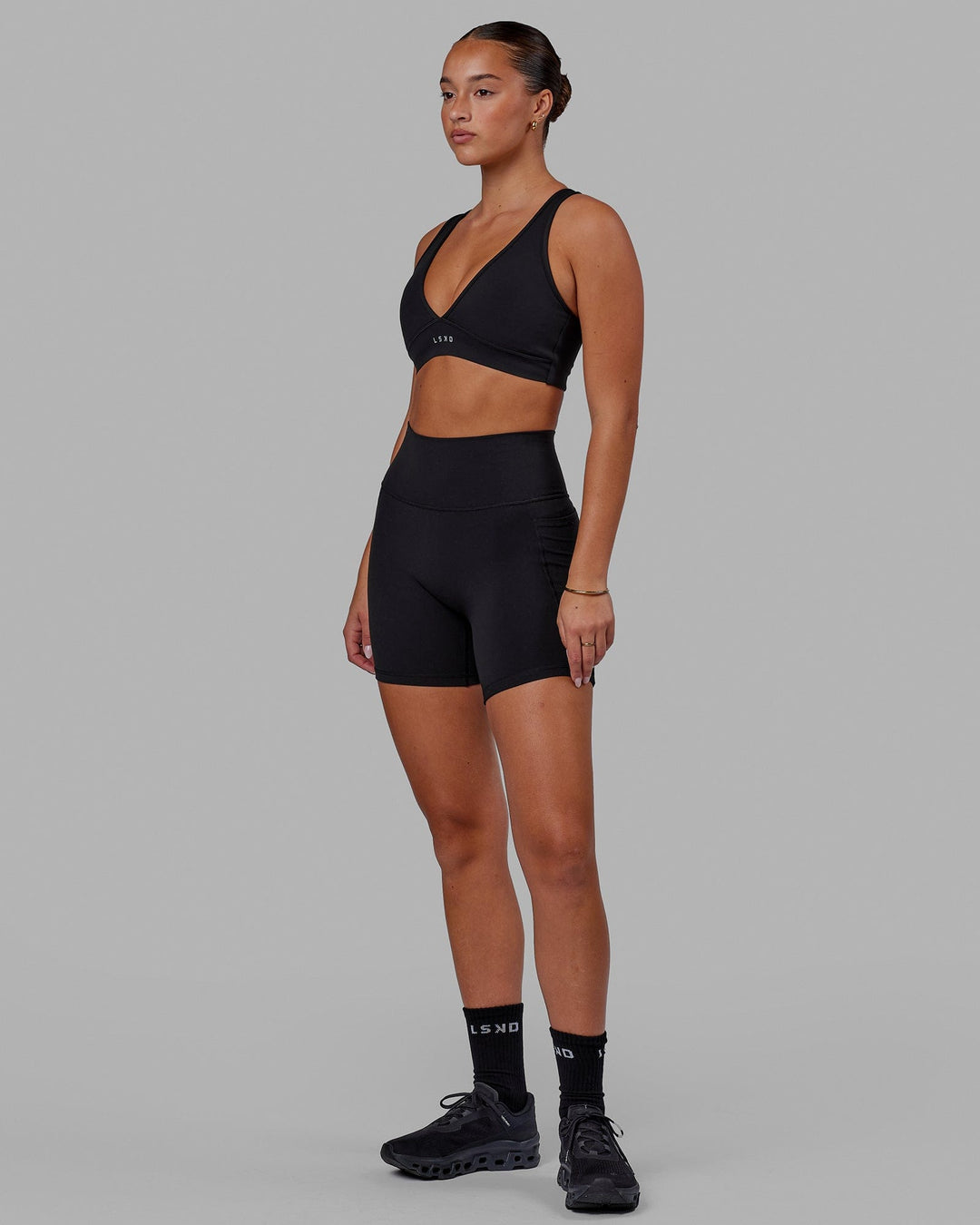 Woman wearing Stamina Sports Bra in Black | Size:S - view 5