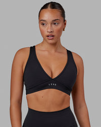 Woman wearing Stamina Sports Bra in Black | Size:S | Thumbnail Index: 6