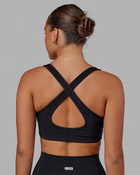 Woman wearing Stamina Sports Bra in Black | Size:S | Thumbnail Index: 5