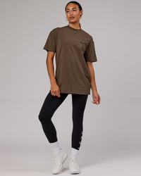  Woman wearing Unisex Capsule FLXCotton Tee Oversize - Army Green | Thumbnail Index: 2