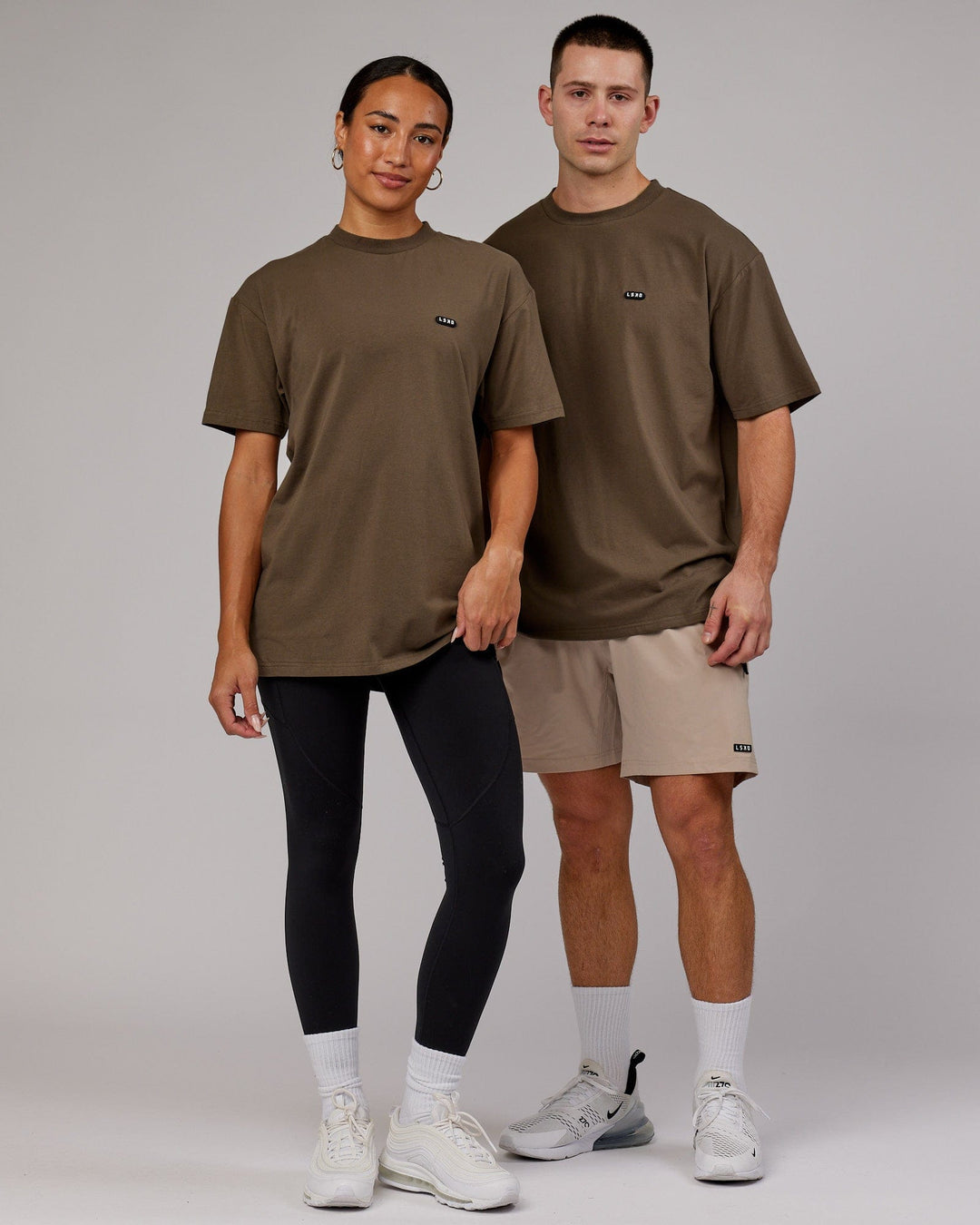 Man and Woman wearing Unisex Capsule FLXCotton Tee Oversize - Army Green - view 1